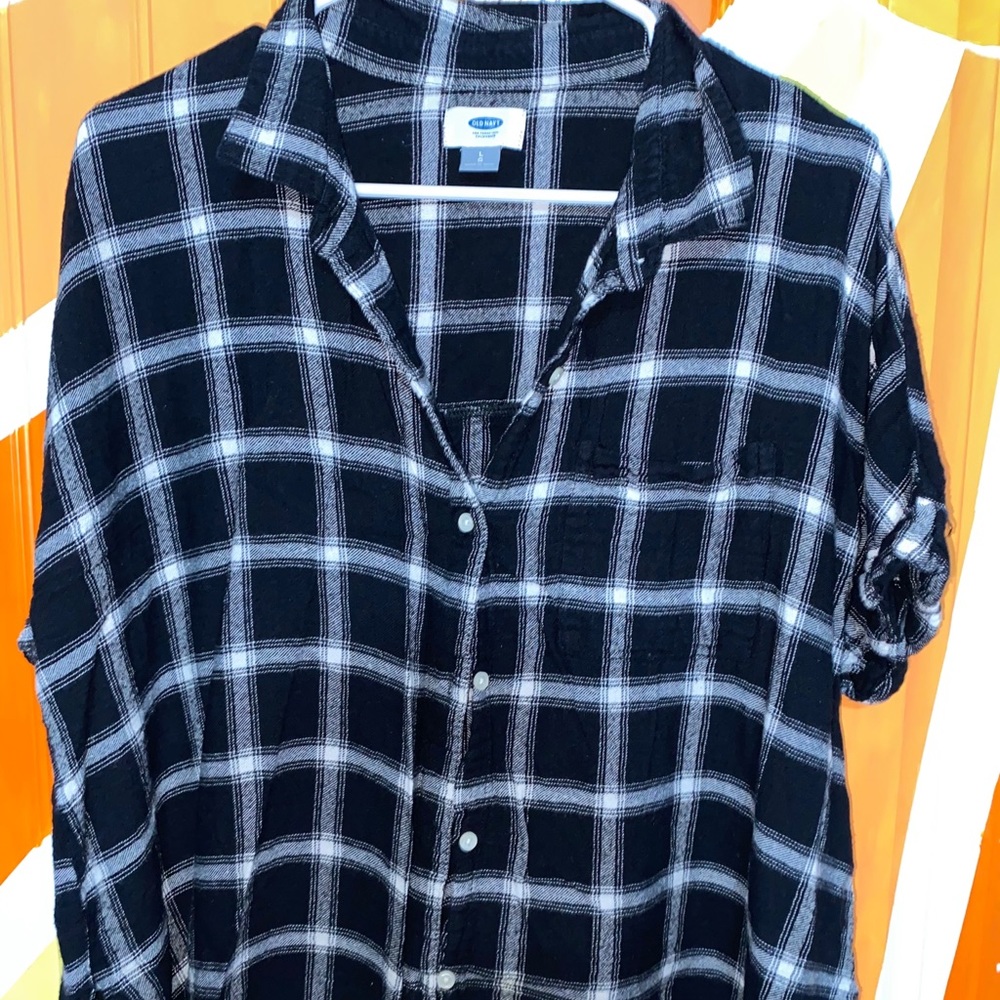 A black and white button up flannel